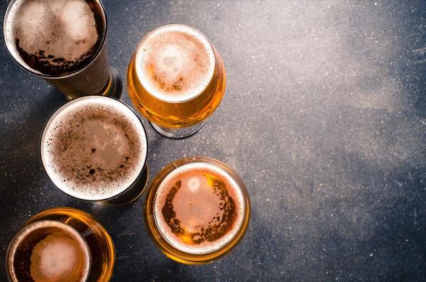 Glasses of beer on a table