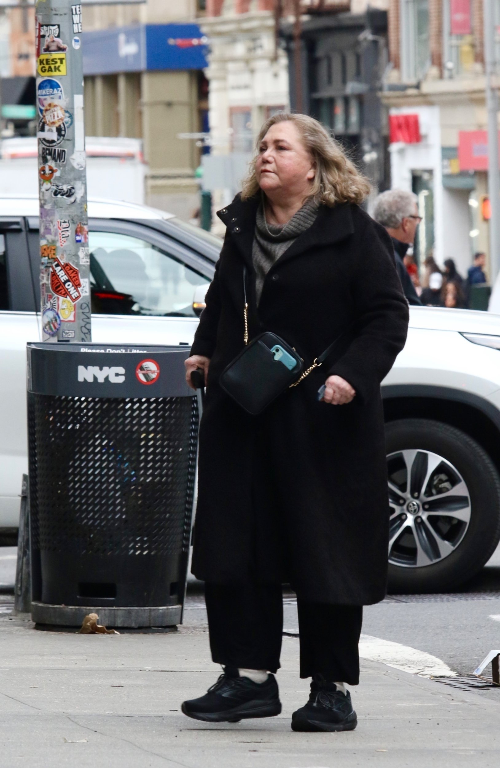 Actress Kathleen Turner looks unrecognizable as she struggles in pain to walk with a cane during a rare public outing in Downtown Manhattan