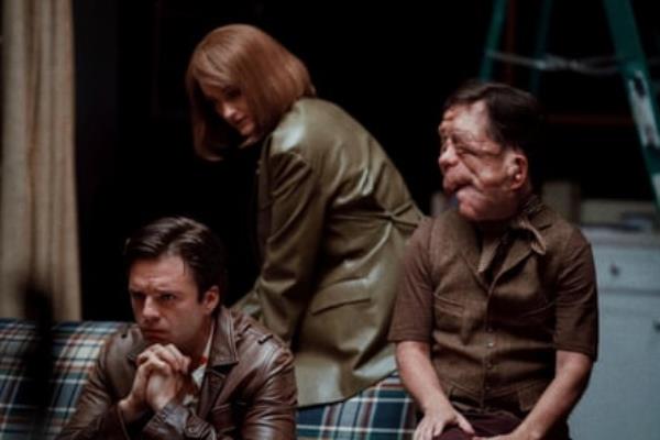 From left, Sebastian Stan, Renate Reinsve and Adam Pearson in a scene from A Different Man.