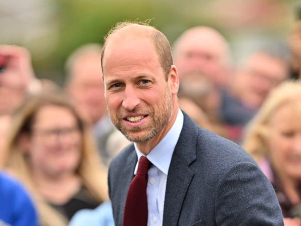 Prince William, Duke of Cambridge, smiling during his visit to Swiss Valley Community Primary School in Llanelli, Wales in 2024.