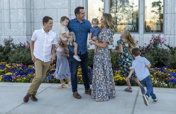 Krit and Stephanie Moore pose for photos with their family at the new Moses Lake Washington Temple on Friday, Sept. 15, 2023.