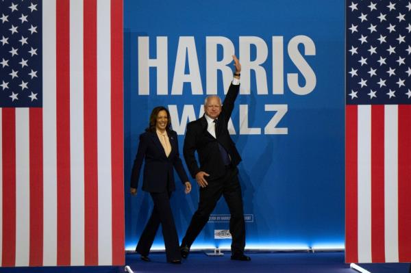 Democratic presidential nominee Vice President Kamala Harris and her running mate Minnesota Gov. Tim Walz arrive for a campaign rally in Philadelphia, Tuesday, Aug. 6, 2024.