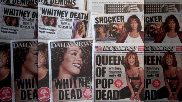 Tabloid newspapers reporting death of Whitney Houston