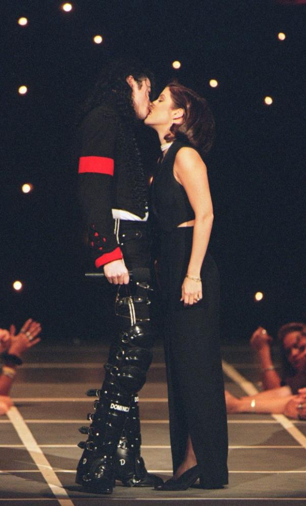 Michael Jackson and Lisa Marie Presley kiss on stage at Radio City Music Hall 8 in NYC in September 1994