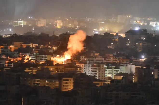 Smoke rises from the site of an Israeli airstrike that targeted a neighborhood in Beirut